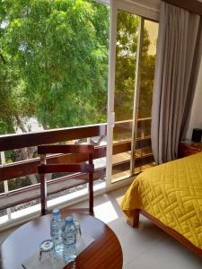 Postel nebo postele na pokoji v ubytování Hotel Viajante