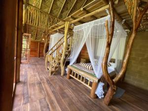 Postel nebo postele na pokoji v ubytování Wood Palace Ella