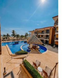 Bazén v ubytování Apartamento de Lujo en Playa Jacó, Frente al Mar, Wifi, AC, Parqueo Privado y Piscinas nebo v jeho okolí