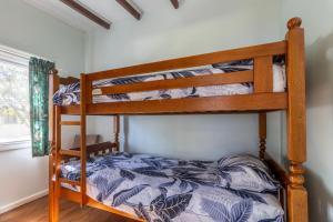 Postel nebo postele na pokoji v ubytování Tree Tops
