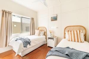 Ένα ή περισσότερα κρεβάτια σε δωμάτιο στο Boorolong 1 - Ocean Views