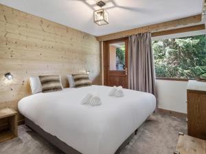 Postel nebo postele na pokoji v ubytování Grand appartement ski in/ski out pour 10 pers. à Saint Martin de Belleville, WiFi, balcon - FR-1-570-63