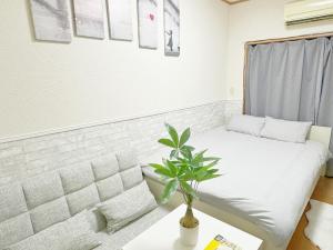 Postel nebo postele na pokoji v ubytování 池袋電車2分最大4人 302