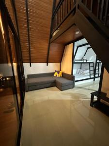a living room with a couch in a house at Casa Olivia in Tuy
