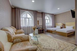 Postel nebo postele na pokoji v ubytování Shah Palace Hotel + 37 fotografií