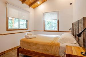 Кровать или кровати в номере Casa PlayaAzul, walk to the beach, 3 rooms