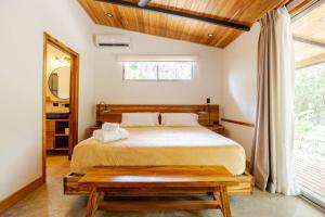 Кровать или кровати в номере Casa PlayaAzul, walk to the beach, 3 rooms