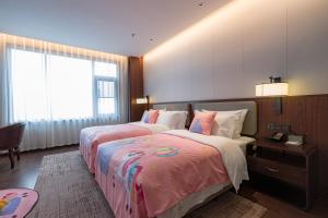 Foto sihtkohas Baoding asuva majutusasutuse 保定宴直隶文旅酒店 galeriist