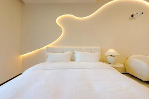 Postel nebo postele na pokoji v ubytování Dream Inn Hotel Beijing