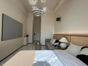 Postel nebo postele na pokoji v ubytování Dream Inn Hotel Beijing
