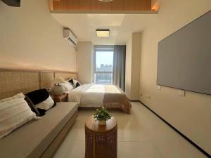 Postel nebo postele na pokoji v ubytování Dream Inn Hotel Beijing