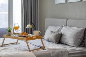 Livin' Holidays - Luxury studio with Bay viewにあるベッド
