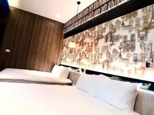 A bed or beds in a room at 陽光空氣水海景電梯民宿 Sunshine Air Water Sea View Homestay