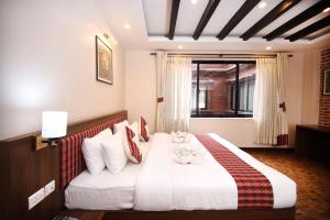 Skye Inn Kathmandu客房内的一张或多张床位