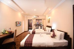 Skye Inn Kathmandu客房内的一张或多张床位