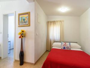 Postel nebo postele na pokoji v ubytování Apartments Beba - peaceful location