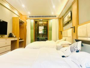 丽江青曼客栈客房内的一张或多张床位