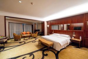 TV a/nebo společenská místnost v ubytování Sheraton Shenzhen Futian Hotel