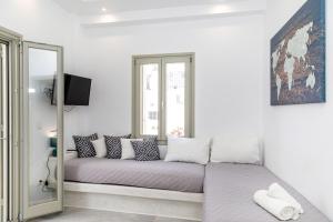 Postel nebo postele na pokoji v ubytování Depis castle naxos