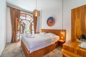 Postel nebo postele na pokoji v ubytování Yulaman Hotel