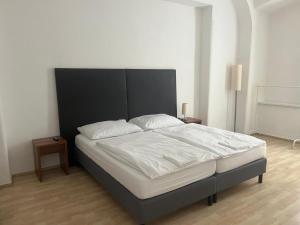 Postel nebo postele na pokoji v ubytování City Inn 24H Self Check-In by H&H Hotels