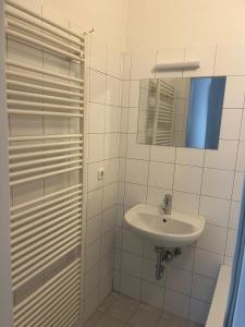Koupelna v ubytování City Inn 24H Self Check-In by H&H Hotels