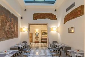 Posezení v ubytování Hotel Machiavelli Palace