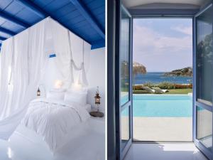 a bedroom with a bed and a view of the ocean at Mykonos Blu, A Grecotel Resort to Live in Psarou