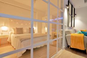 Postel nebo postele na pokoji v ubytování EDEN Beach Apartment