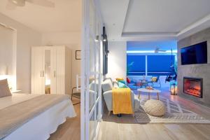 Postel nebo postele na pokoji v ubytování EDEN Beach Apartment + 37 fotografií
