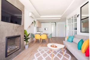TV a/nebo společenská místnost v ubytování EDEN Beach Apartment