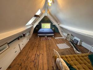 En eller flere senge i et værelse på Belle maison de charme La p’tite parenthèse