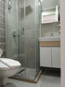 Koupelna v ubytování M2 Hotel