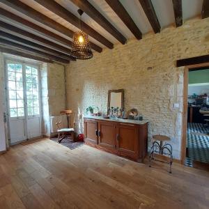 a large room with a vanity and a mirror at La Firmière - Maison de maître - Famille et amis in Omméel +39 photos