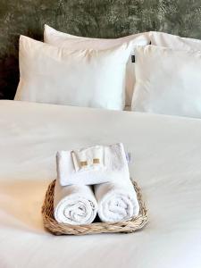 Postel nebo postele na pokoji v ubytování Baankao Resort Rayong
