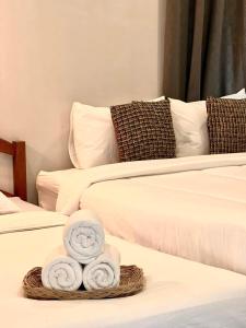 Postel nebo postele na pokoji v ubytování Baankao Resort Rayong