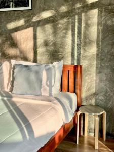 Postel nebo postele na pokoji v ubytování Baankao Resort Rayong