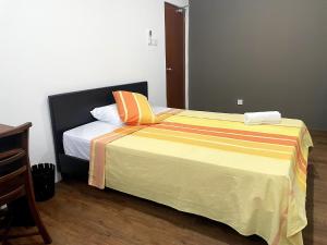Postel nebo postele na pokoji v ubytování Jays Guest - Rajagiriya Colombo