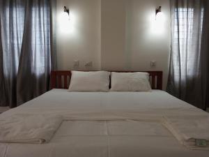 CHAEL Airport Residency,Nedumbassery Cochin客房内的一张或多张床位