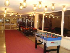 a room with a pool table and ping pong balls at NEU! Fernblick Hohegeiß Sauna Hallenbad in Hohegeiß