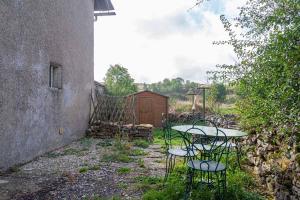 Zahrada ubytování Gîte Gîte La Bastide 2/4 personnes à Sauveterre