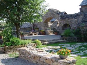 Zahrada ubytování Gîte Gîte La Bastide 2/4 personnes à Sauveterre