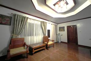 Posezení v ubytování Gilin Suites Puerto Princesa Palawan