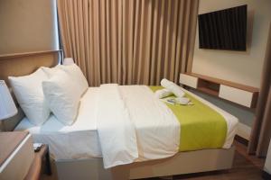 Katil atau katil-katil dalam bilik di Avioré Hotel Tacloban