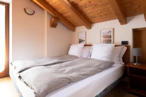 Postel nebo postele na pokoji v ubytování Chalet Vedig
