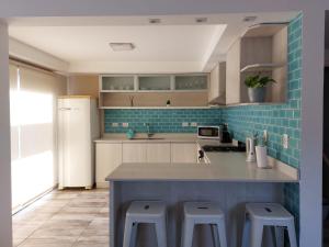 Η κουζίνα ή μικρή κουζίνα στο Casa alquiler temporal Santa Clara del Mar