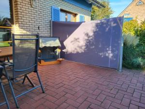 Fotografie z fotogalerie ubytování Ferienhaus Urlaub am Meer mit Terrasse, Balkon und großem Garten v destinaci Tating