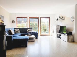 Fotografie z fotogalerie ubytování Ferienhaus Urlaub am Meer mit Terrasse, Balkon und großem Garten v destinaci Tating