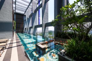a swimming pool on the top of a building at Millerz Square by MyKey in Kuala Lumpur