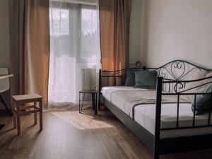 Postel nebo postele na pokoji v ubytování Das Luis